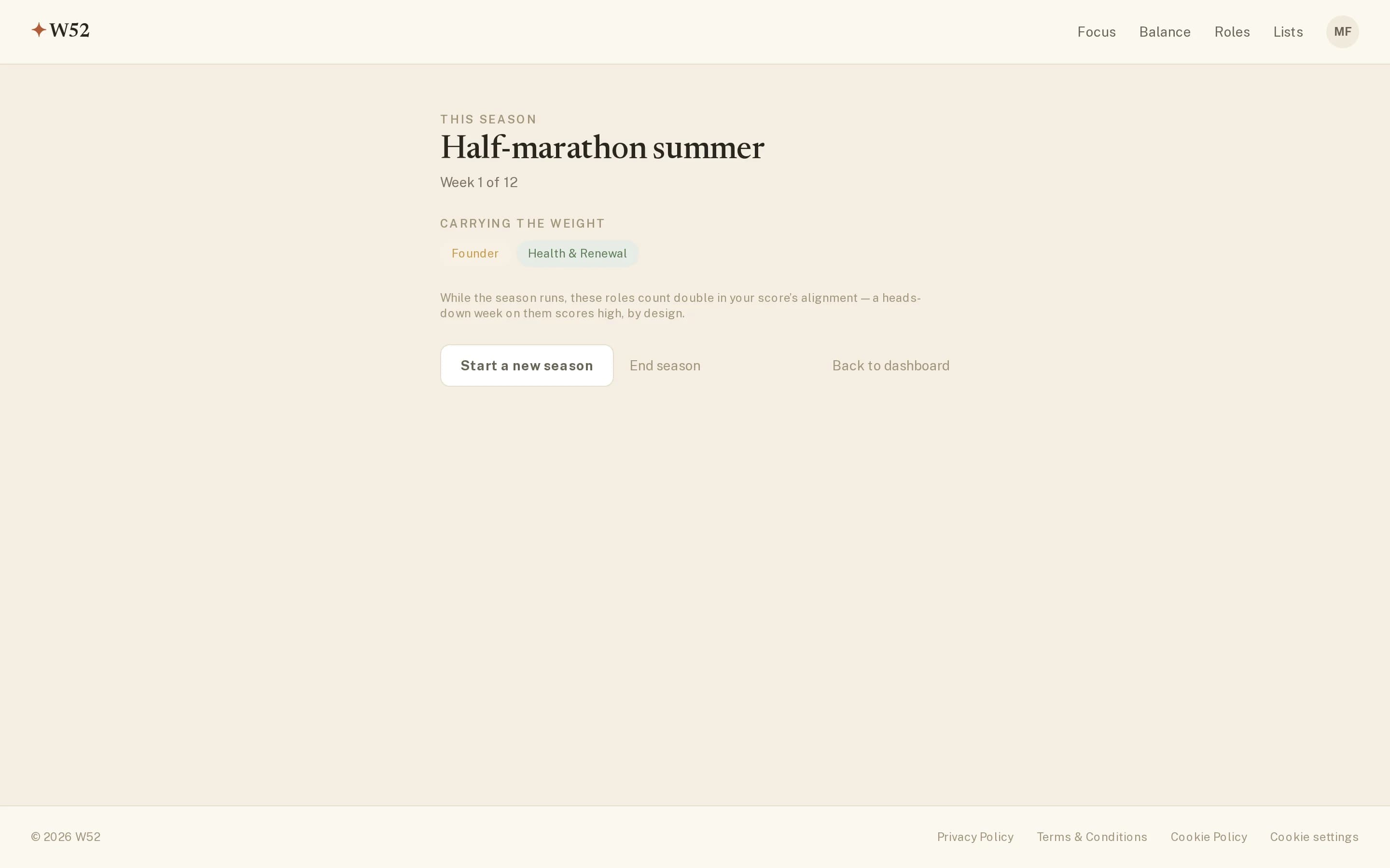The W52 season screen showing 'Half-marathon summer', week 1 of 12, with Founder and Health & Renewal named as the roles carrying the weight.